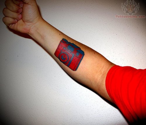 Red Ink Camera Tattoo On Arm