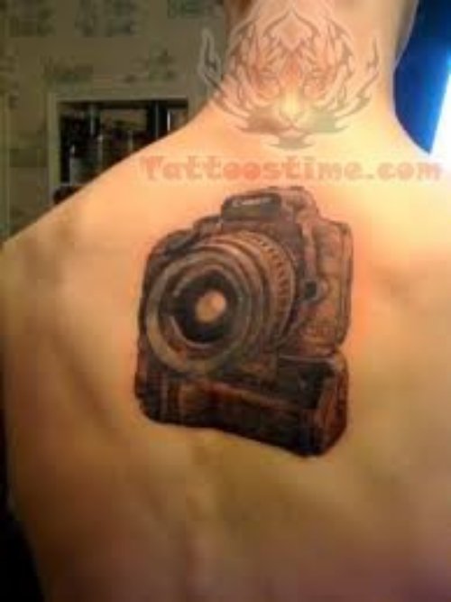 Camera Tattoo On Boy Upper Back