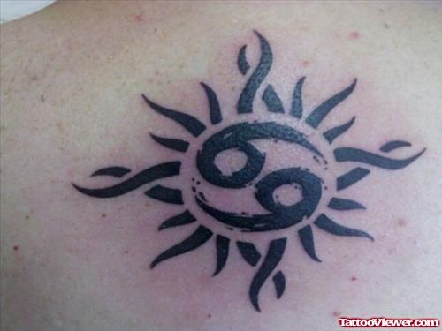 Tribal Sun And Cancer Tattoo
