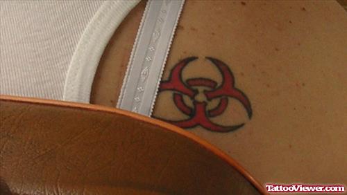 Tribal Red Ink Cancer Tattoo On Back Shoulder