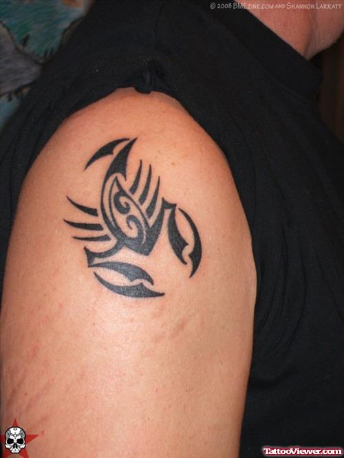Tribal Cancer Tattoo On Shoulder