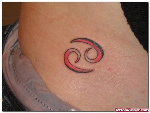 Red ink Cancer Tattoo On Hip