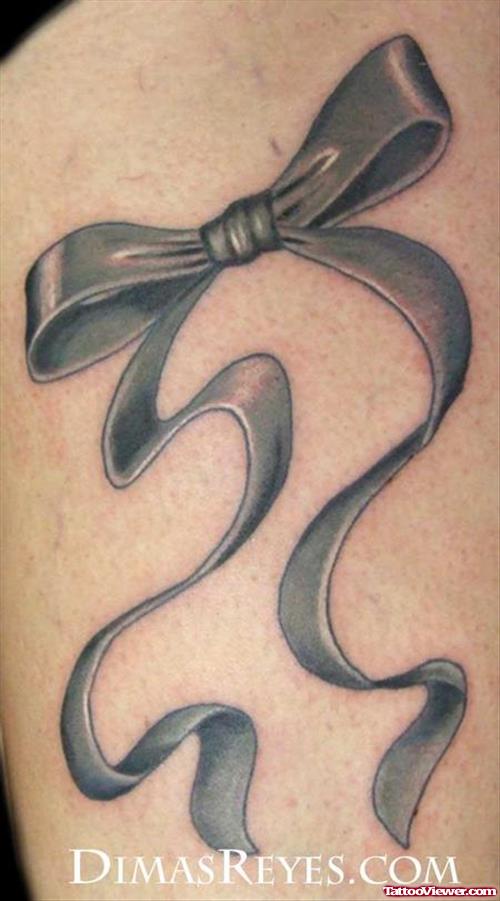 Grey Ink Bow And Ribbon Cancer Tattoo