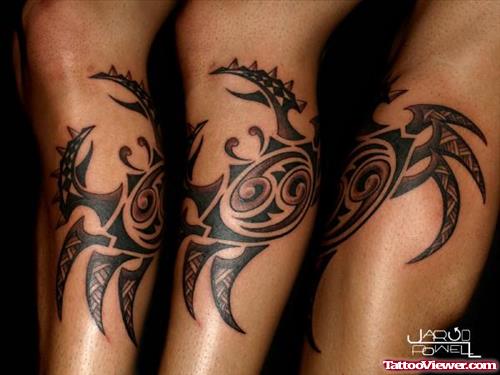 Tribal Cancer Tattoo On Leg