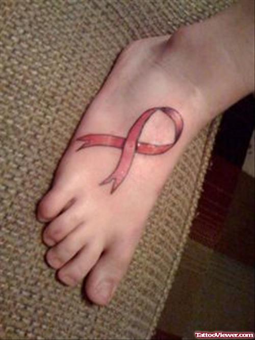 Ribbon Cancer Tattoo On Right Foot