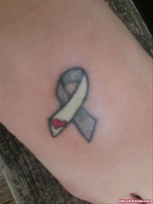 Tiny Heart And Ribbon Cancer Tattoo