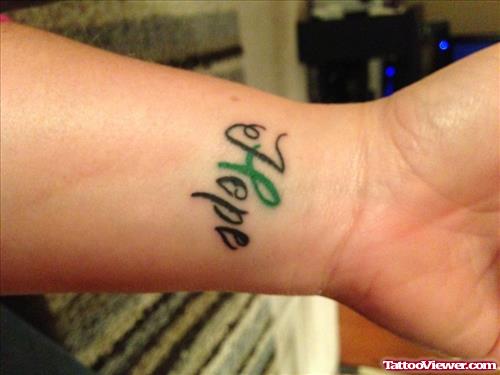 Hope Cancer Tattoo On Wrist