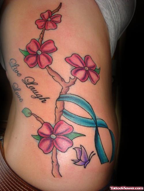 Flowers Tree And Butterfly With Ribbon Cancer Tattoo On Side Rib