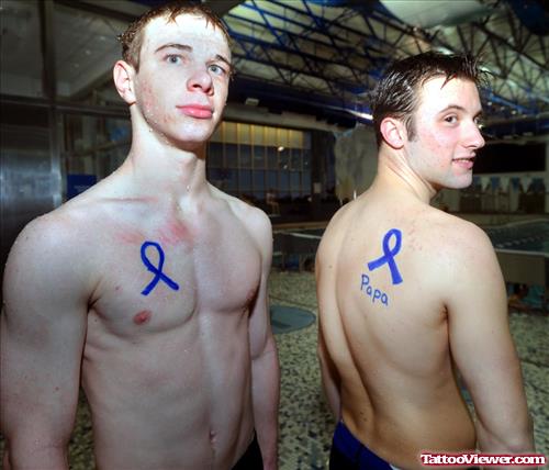 Blue ink Colon Cancer Tattoo on Back And Chest