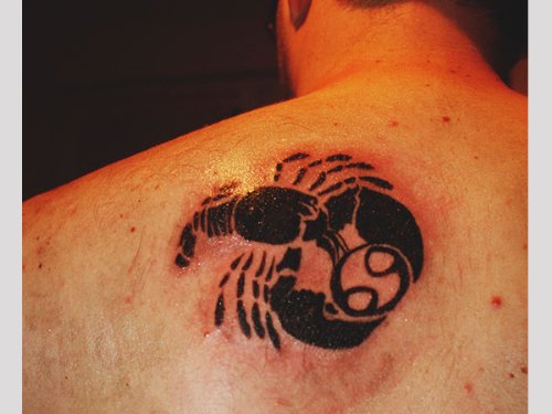 Left Back Shoulder Black Ink Cancer Tattoo