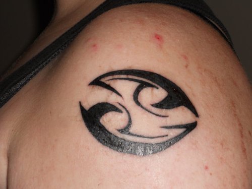 Black Ink Tribal Cancer Tattoo On Shoulder