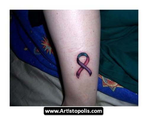 Cancer Tattoo On Left Leg
