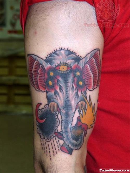 Elephant And Candle Tattoo