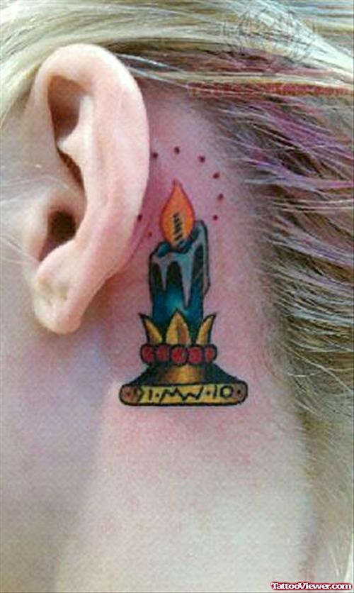 Burning Candle Tattoo Behind Ear