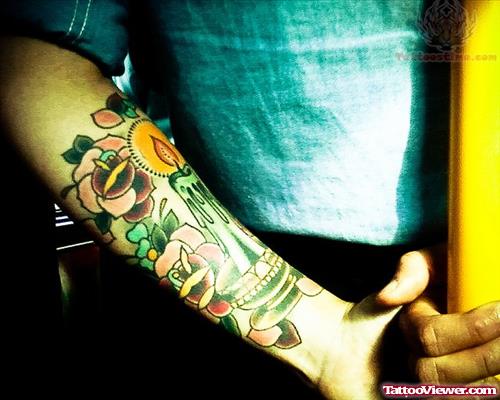 Candle And Flower Tattoo On Arm
