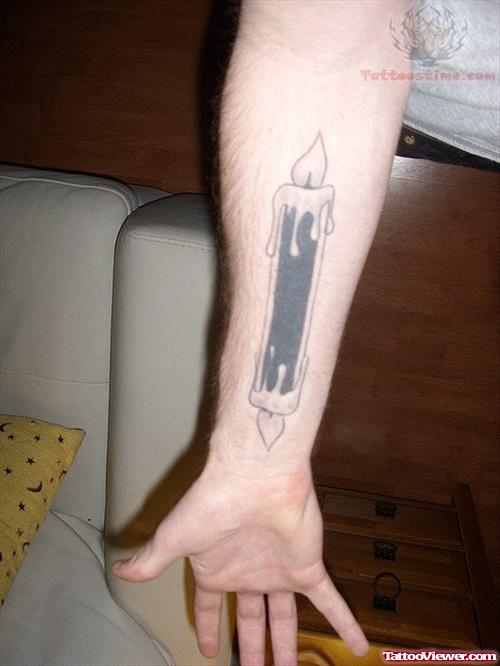 Black Burning Candle Tattoo On Arm