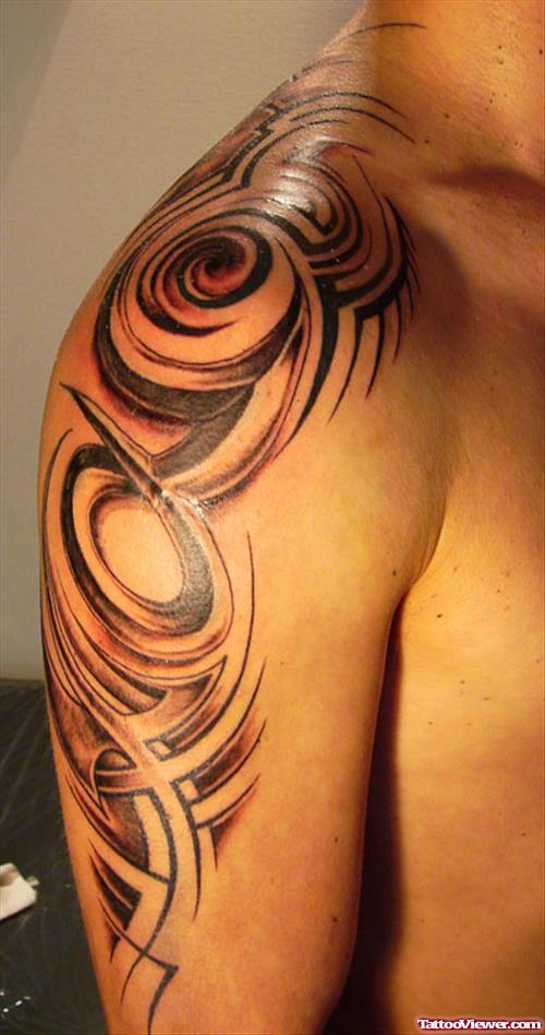 Tribal Capricorn Tattoo On Man Right Half Sleeve