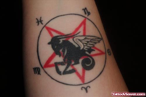 Pentagram And Winged Capricorn Tattoo