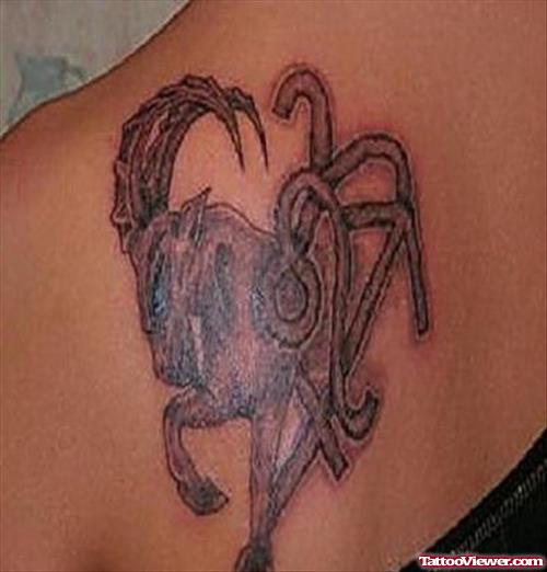 Grey Ink Capricorn Tattoo On Shoulder