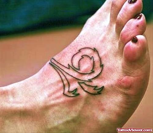 Tribal Capricorn Tattoo On Right Foot For Girls