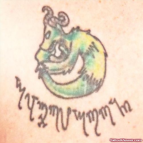 Green Ink Capricorn Tattoo
