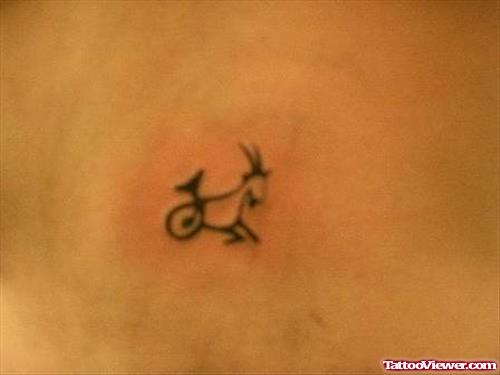 Small Capricorn Zodiac Sign Tattoo