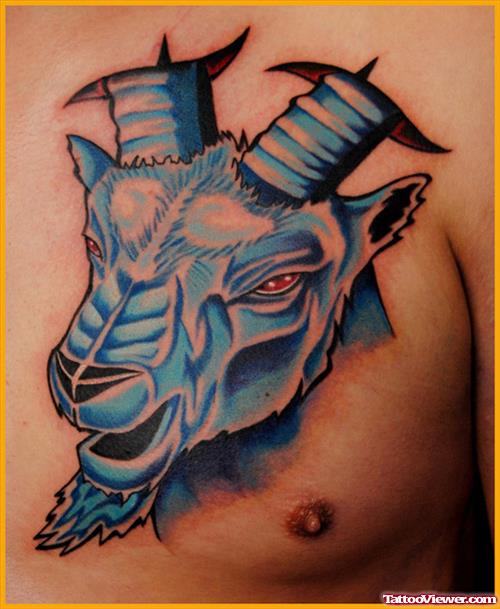 Blue Ink Capricorn Tattoo On Man Chest