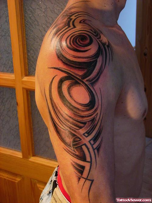 Black Ink Tribal Capricorn Tattoo On Sleeve
