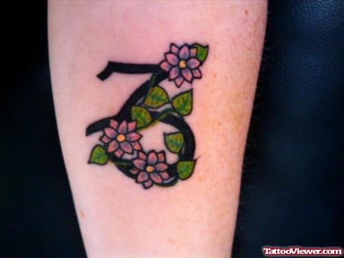 Flowers And Capricorn Zodiac Tattoo