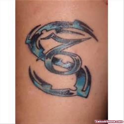 Blue Ink Tribal Capricorn Tattoo