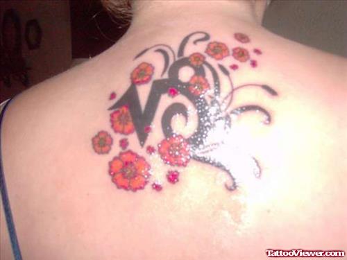 Red flowers And Capricorn Tattoo On Upperback