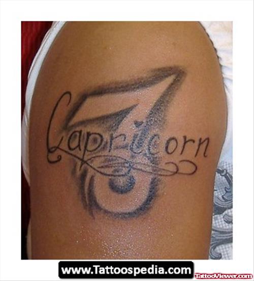 Grey Ink Capricorn Tattoo On Left Leg