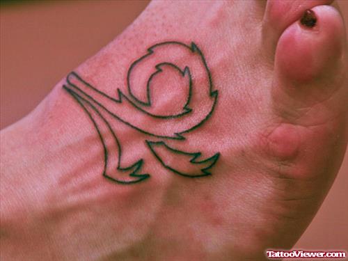 Tribal Capricorn Tattoo On Right Foot