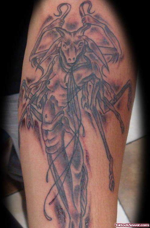 Grey Ink Capricorn Tattoo On Sleeve
