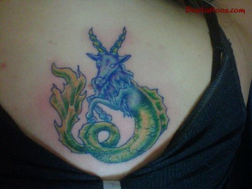 Colored Capricorn Tattoo On Chest