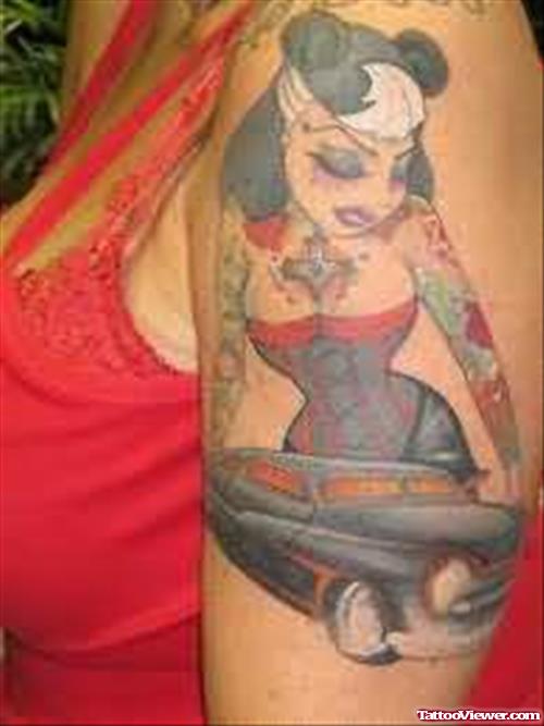 Car & Girl Tattoo On Bicep