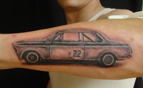 Twenty Two Number Car Tattoo On Left Arm