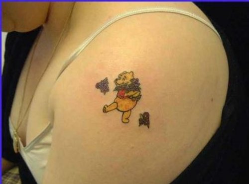 Winnie Pooh Cartoon Tattoo On Left Shoulder