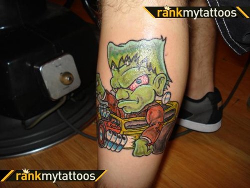 Colored Cartoon Tattoo On Left Leg