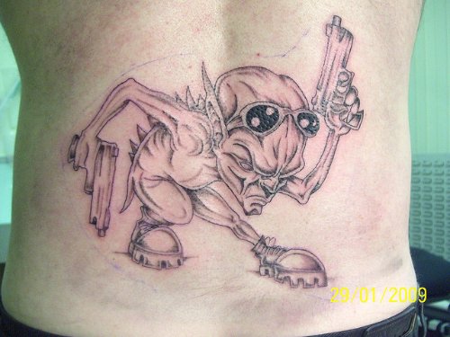 Grey Ink Scary Cartoon Tattoo On Back