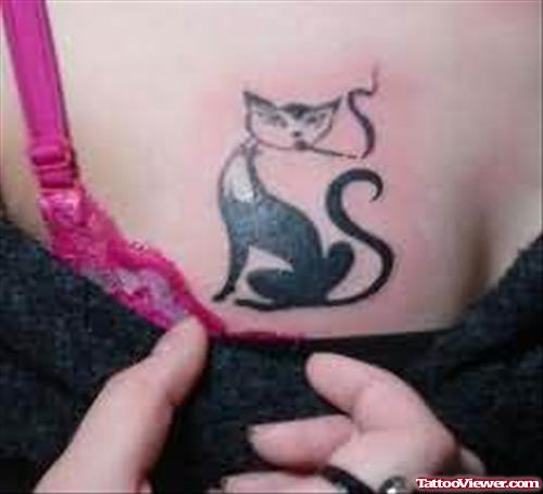 Small Cat Tattoo On Chest