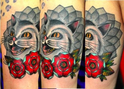 Red Flower And Cat Tattoo On Leg