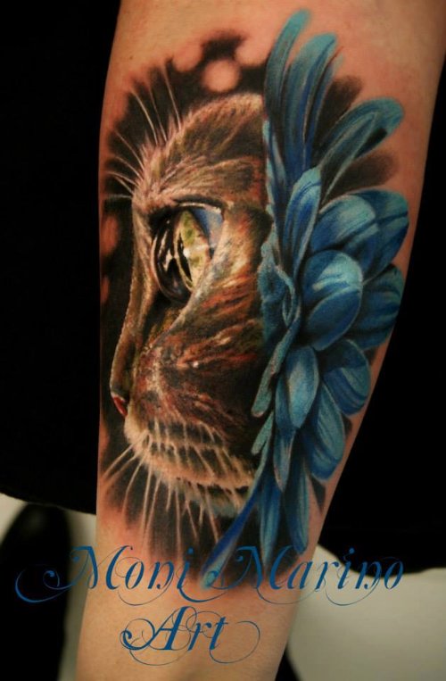 Blue Flower And Cat Head Tattoo On Arm