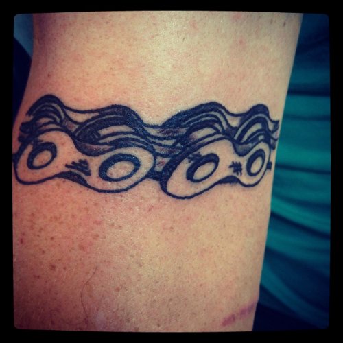 Nice Grey Ink Bike Chain Tattoo