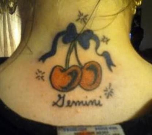 Bow and Cherries Tattoo On Back Neck
