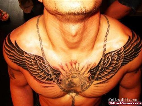 Large Winged Jesus Head Chest Tattoo For Men
