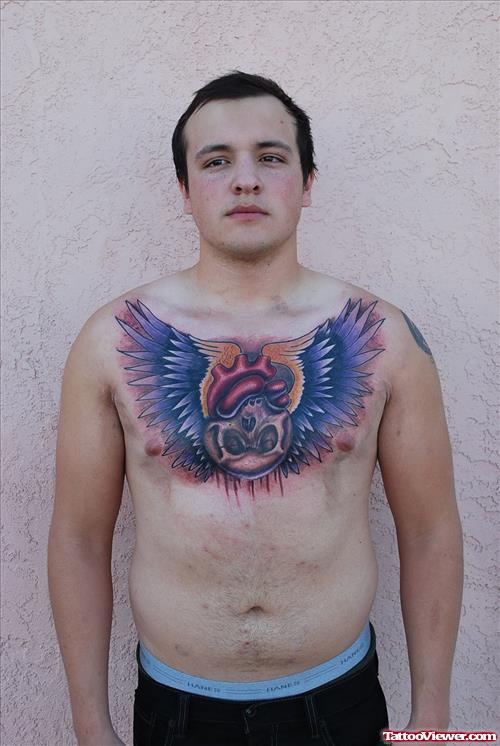 Awesome Colored Winged Heart Chest Tattoo