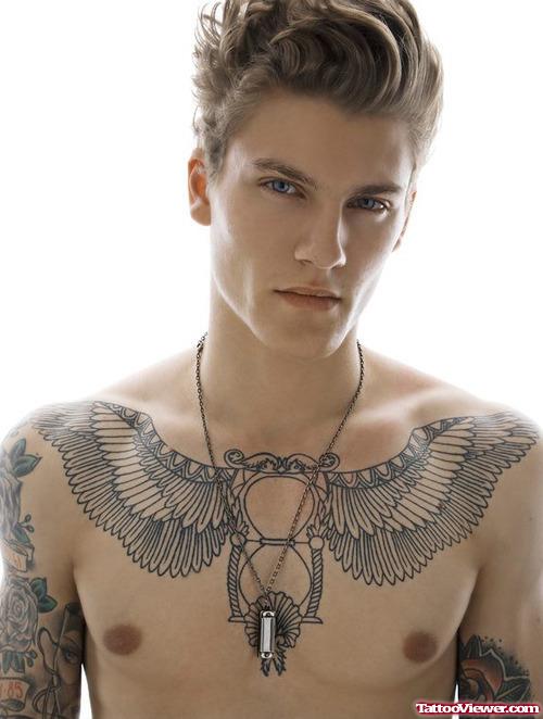 Awesome Grey Ink Winged Hourglass Chest Tattoo