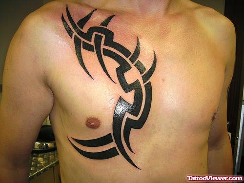 Black Ink Tribal Chest Tattoo For Men