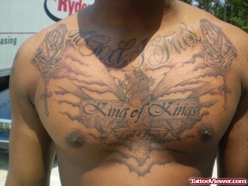Grey Ink Praying Hands - King Of Kings Crown Cross Grey Ink Tattoo On Man Chest